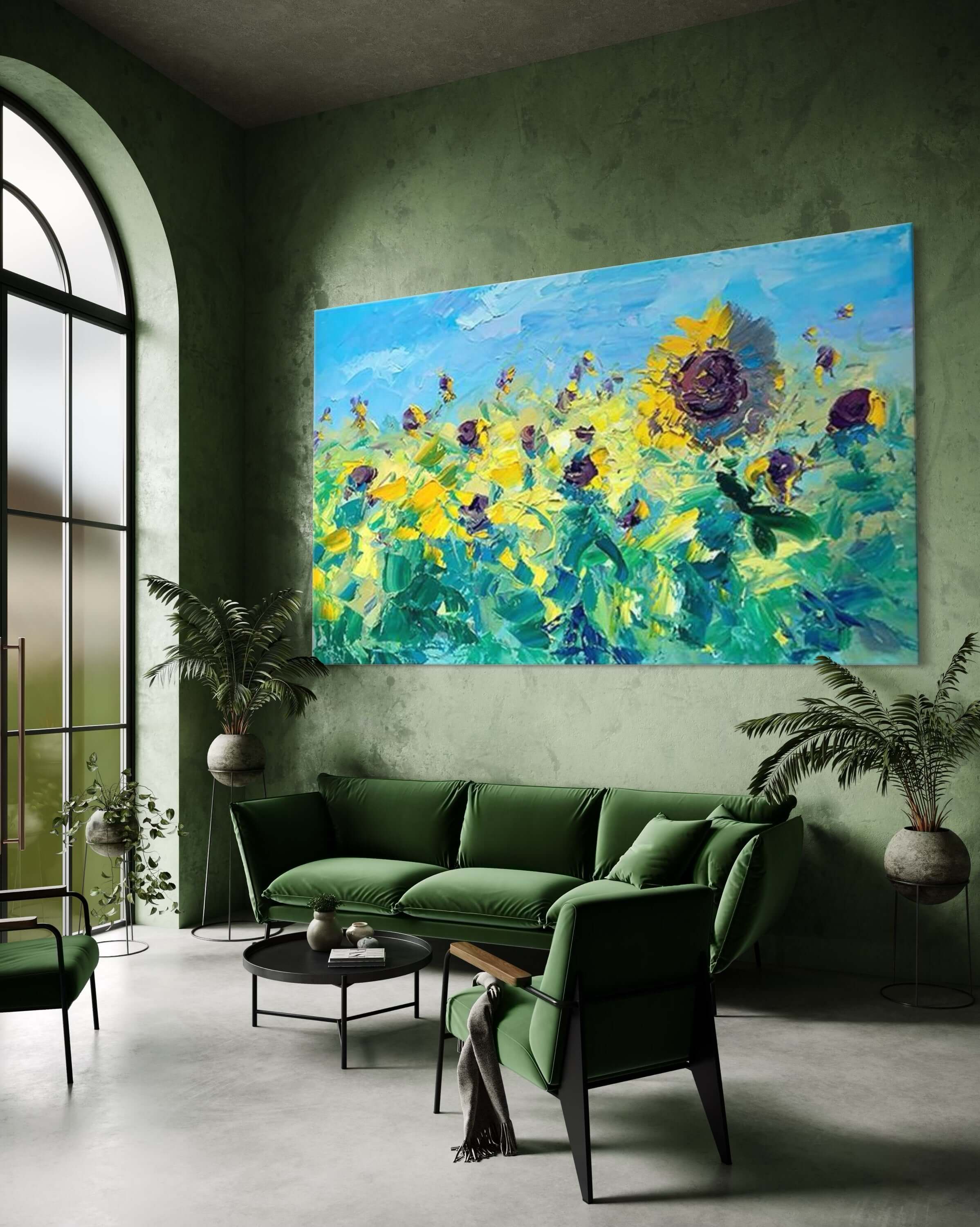 Vibrant hand-painted sunflower wall art in a green living room, enhancing the space with color and vitality.