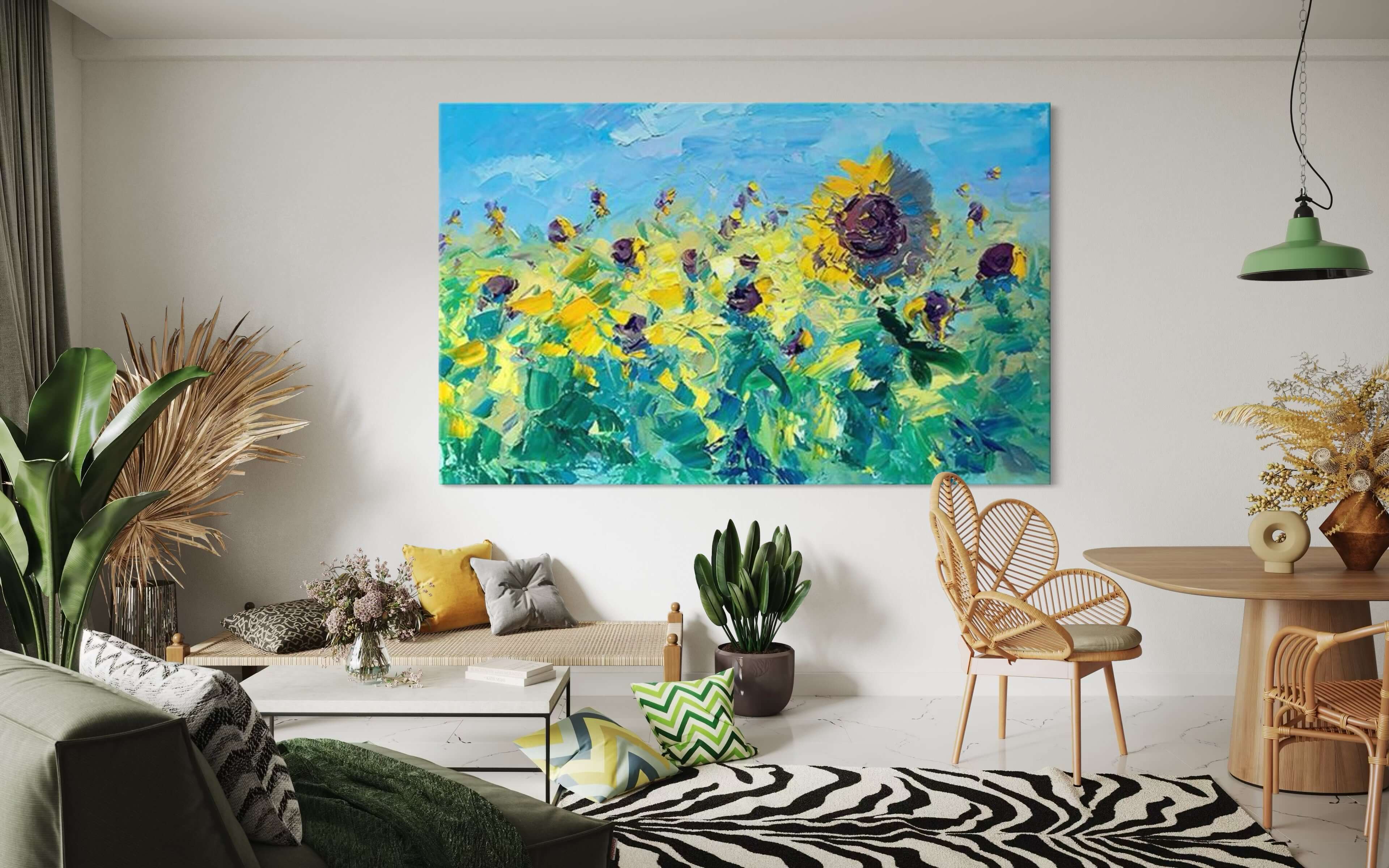 Vibrant hand-painted sunflower wall art in a bright living room, enhancing the space with color and vitality.