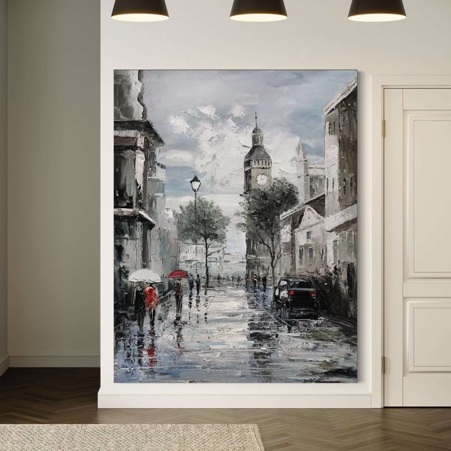 Hand-painted wall art depicting a rainy Parisian street with iconic clock tower and people carrying umbrellas. Nuovi arrivi