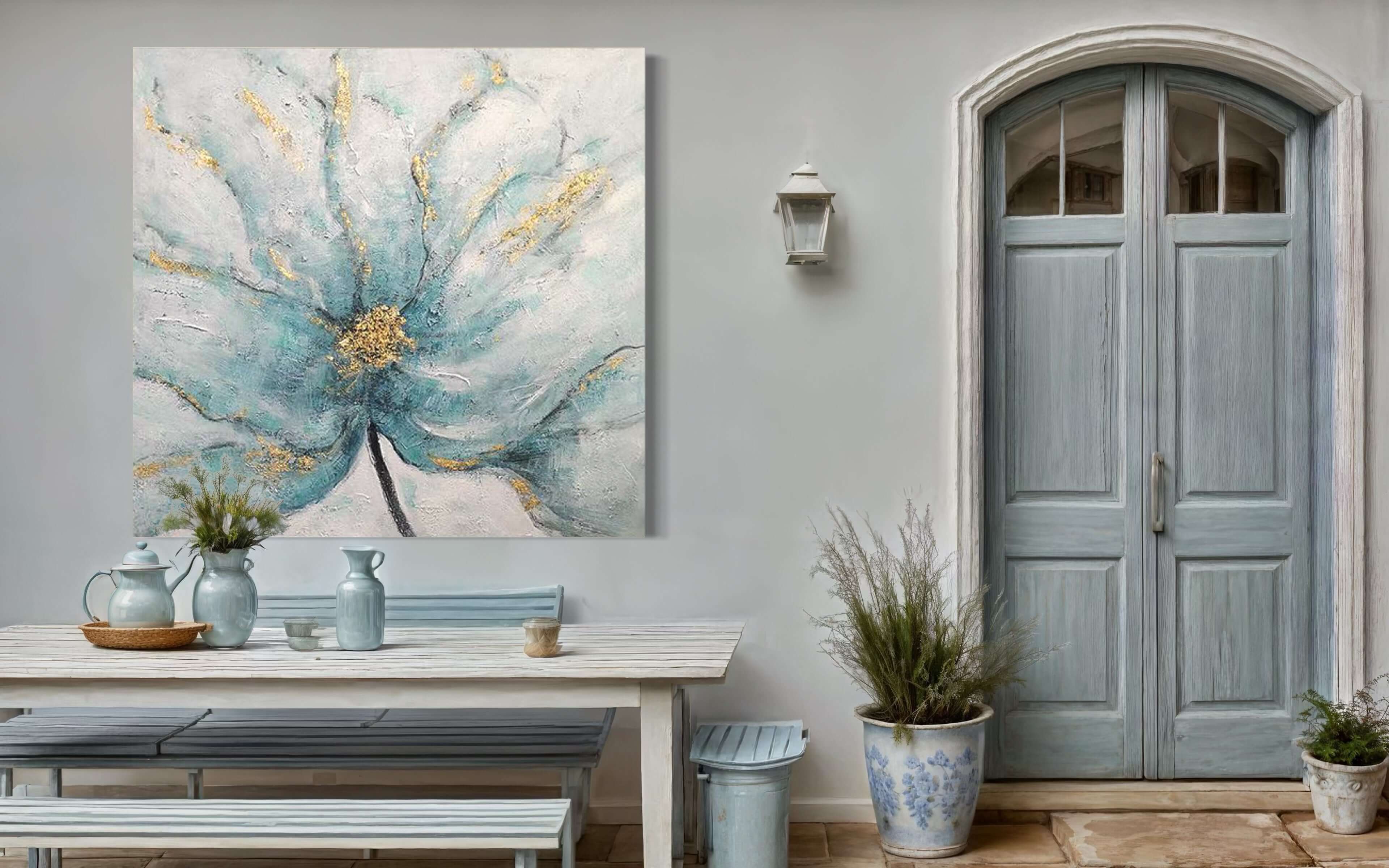 Artwork featuring a blue flower on a wall, set in an elegant dining area with a blue door and outdoor decor.