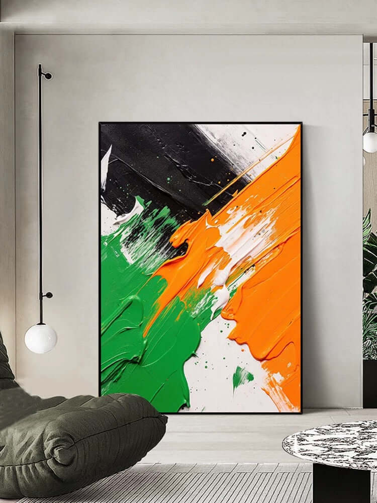 Arte de pared texturizado en negro, blanco, naranja y verde
