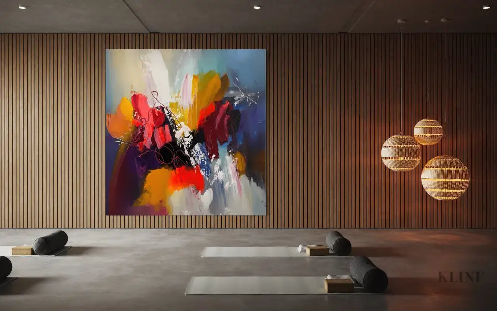 Vibrant Frenzy abstract artwork by John Rey U in modern interior, featuring fiery reds and dynamic brushstrokes.