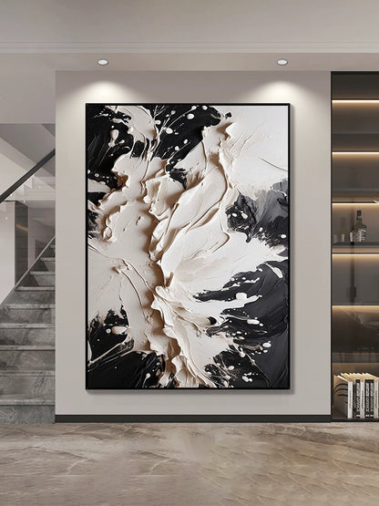 Black and cream abstract textured wall art adding luxury and modern elegance to upscale decor.