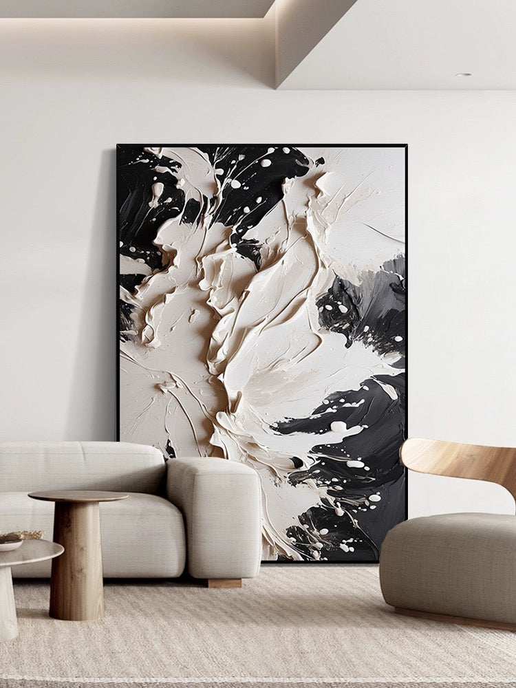 Bold black and cream textured wall art adding luxury and sophistication to modern decor.