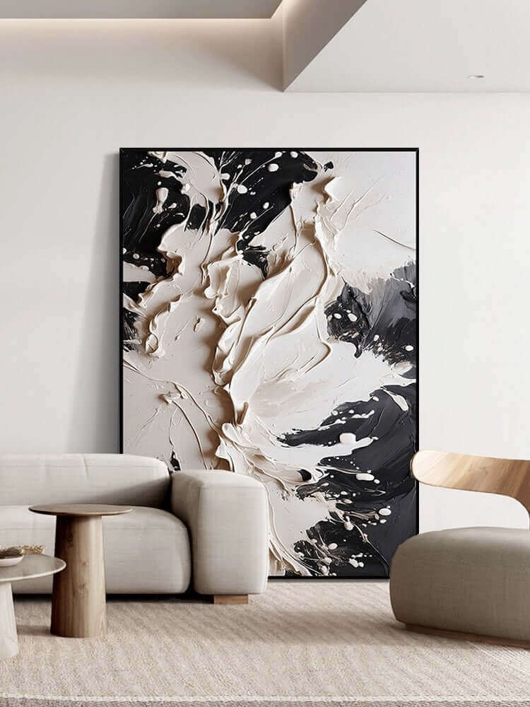 Bold black and cream textured wall art adding luxury and sophistication to modern decor. 