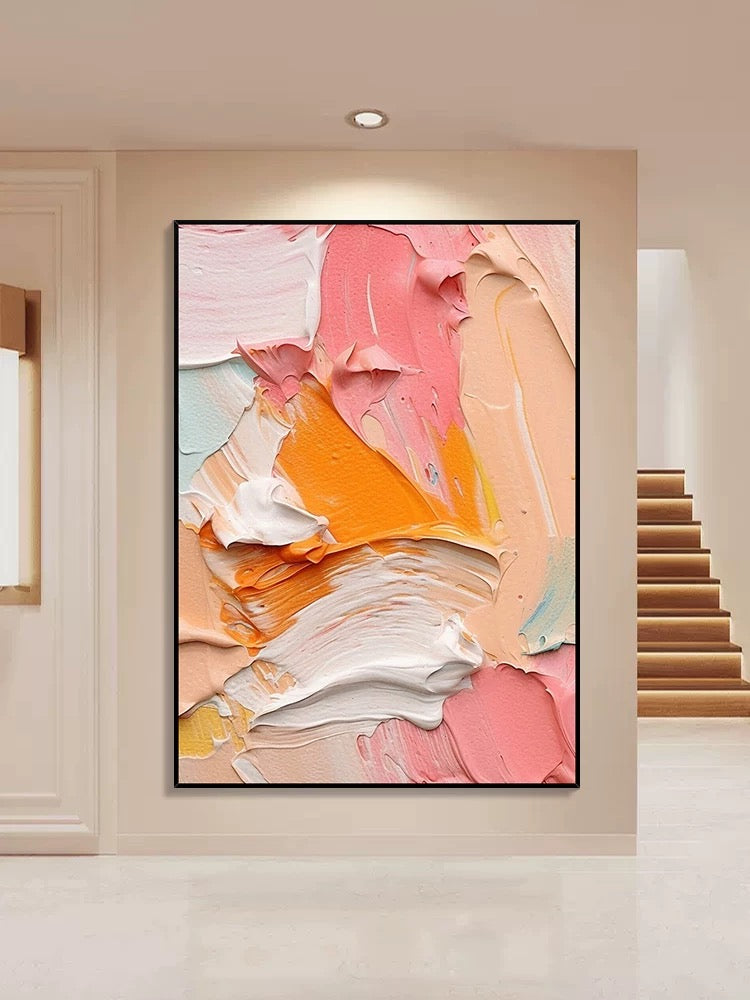 Arte de pared texturizado en tonos rosa, naranja y blanco