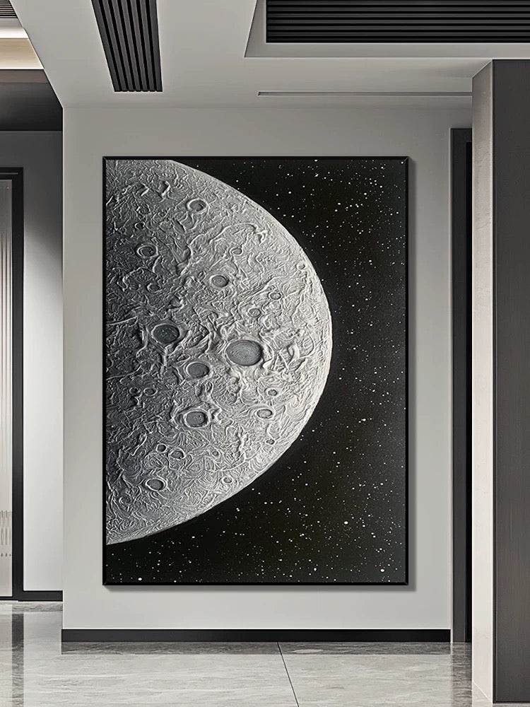 Arte de pared texturizado con luna negra y plateada