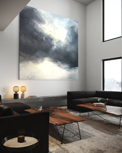 Radiance Amidst the Ash artwork by John Rey U. displayed in a modern living room, featuring abstract light and shadow.