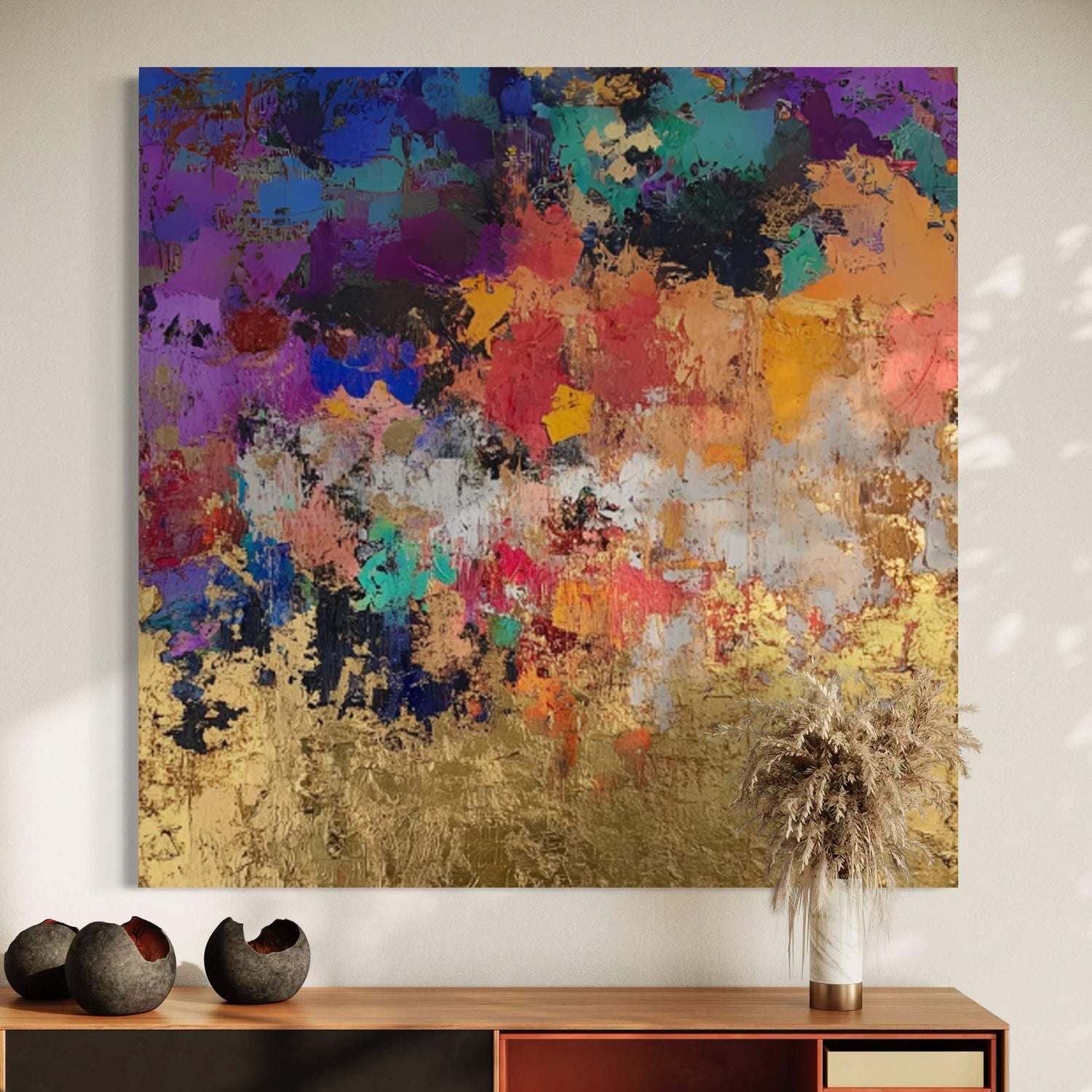 Vibrant hand-painted wall art with gold accents, enhancing modern home decor and inviting warmth.