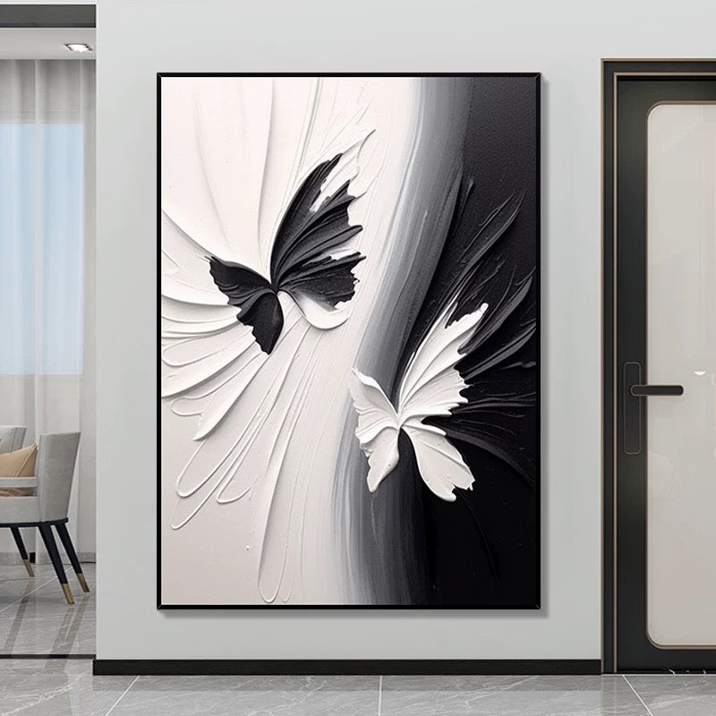 Arte de pared texturizado con mariposas en blanco y negro