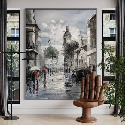 Hand-painted wall art depicting a Parisian street scene with wet pavement, umbrellas, and historic buildings.