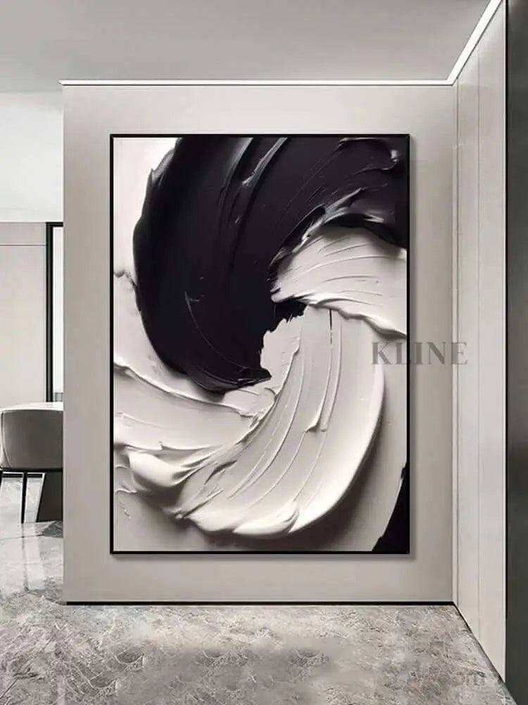 Black and white textured wall art featuring thick paint layers, showcasing dynamic movement and captivating contrast.