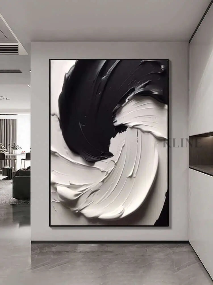 Black and white heavy textured wall art showcasing dynamic paint layers and unique light reflections. 