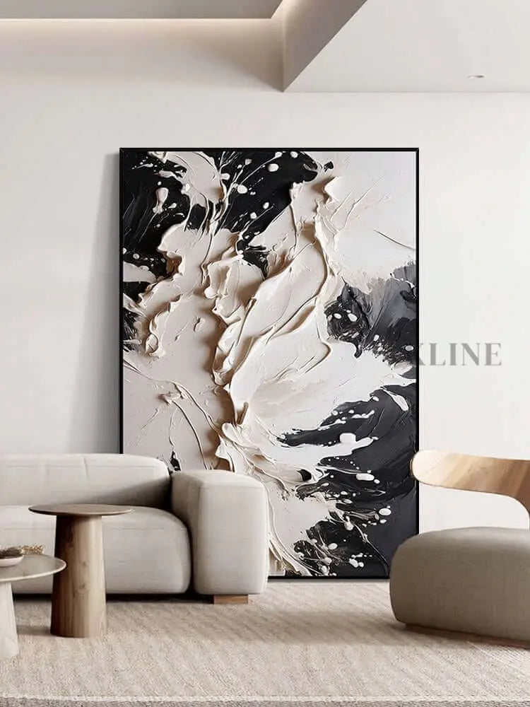 Bold black and cream textured wall art adding luxury and sophistication to modern decor. لوحات بالأبيض والأسود
