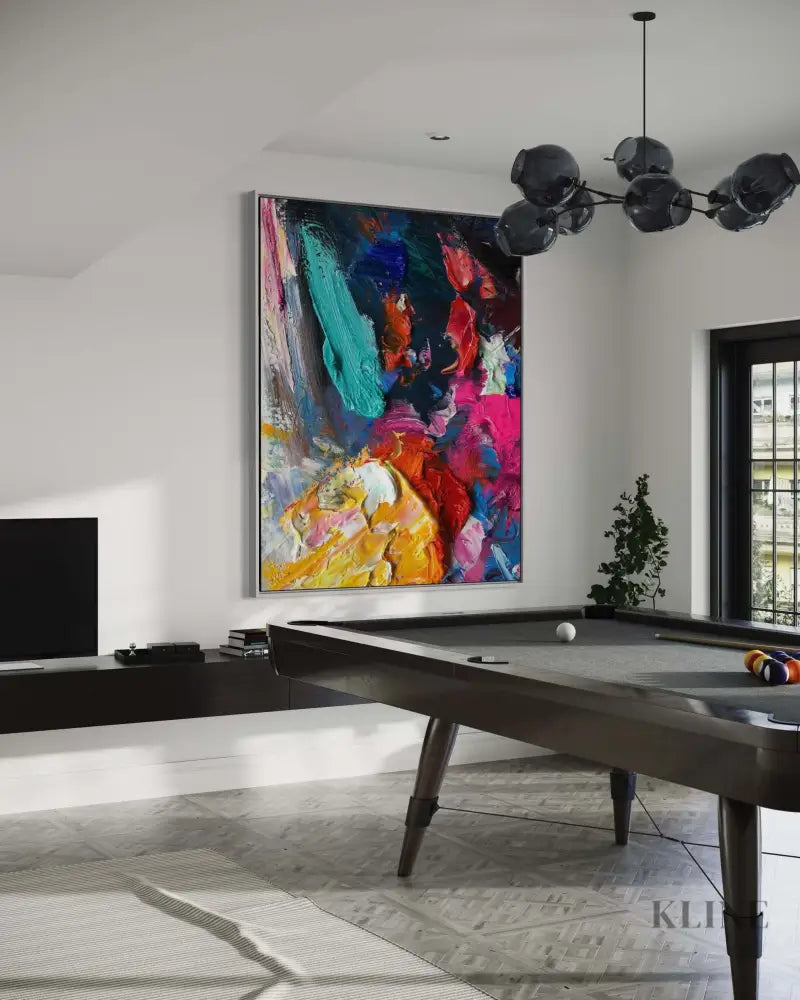 Vibrant hand-painted wall art in a modern game room, enhancing the space with color and creativity. Shop All