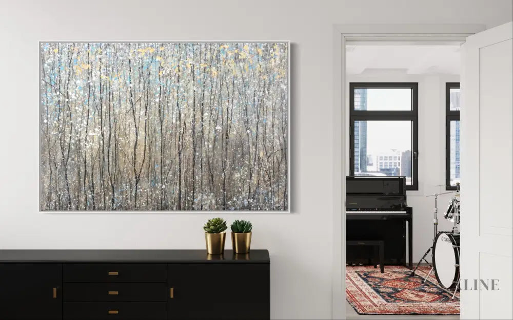 Framed abstract artwork of a spring forest hanging in a modern living room, featuring vibrant colors and lively composition. 