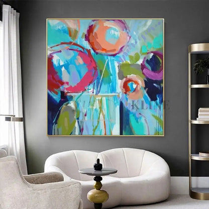 Vibrant hand-painted wall art featuring bold flowers in blue and orange tones, perfect for elevating your home decor.