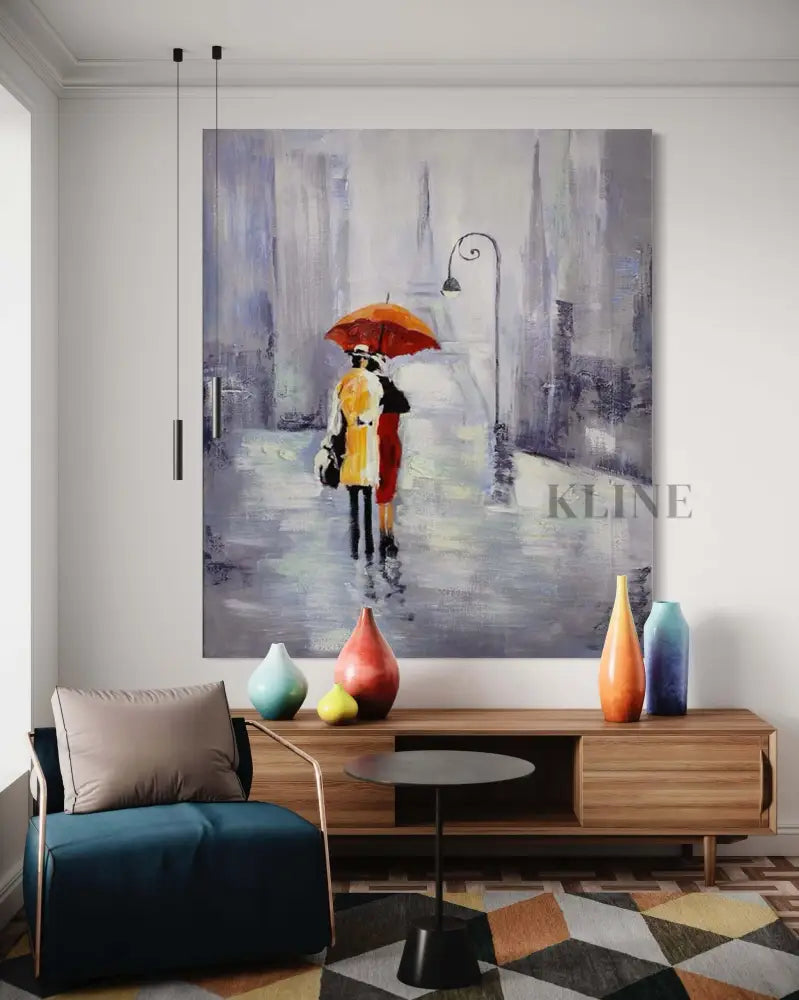 Hand-painted wall art depicting a couple with an umbrella in a rainy cityscape, enhancing home décor. Art mural sur toile