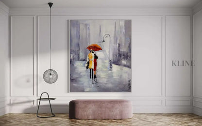 Hand-painted wall art featuring a couple with an umbrella in a Parisian setting, enhancing modern home decor.