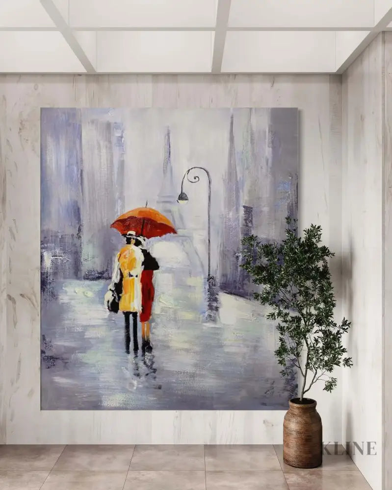 Hand-painted wall art of a couple under an orange umbrella, enhancing modern home decor with vibrant colors. Shop All