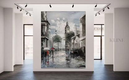 Hand-painted wall art of a misty Paris street, showcasing adventure and charm in a modern gallery setting.