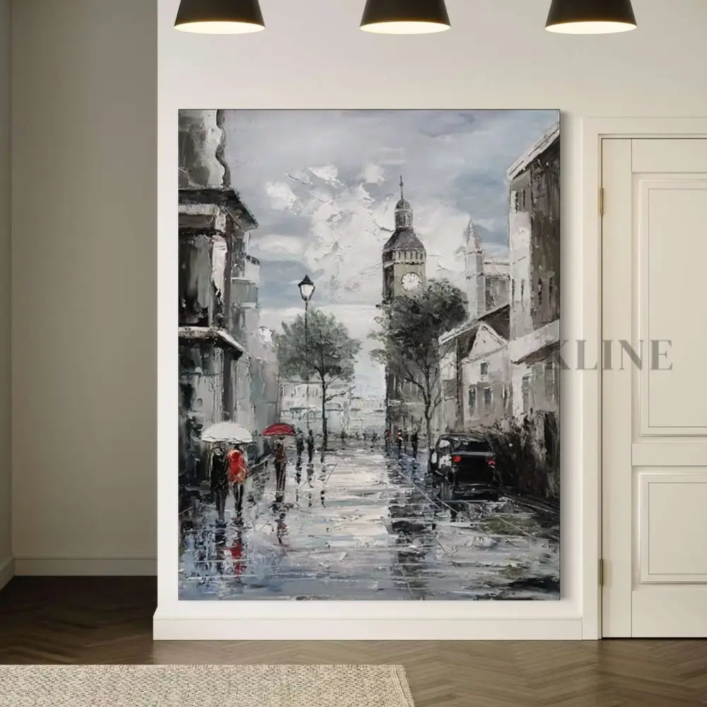 Hand-painted wall art depicting a rainy Parisian street with iconic clock tower and people carrying umbrellas. 