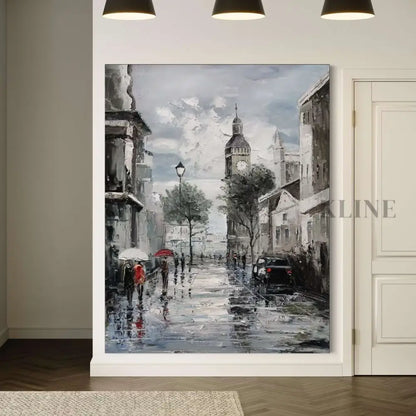 Hand-painted wall art depicting a rainy Parisian street with iconic clock tower and people carrying umbrellas.