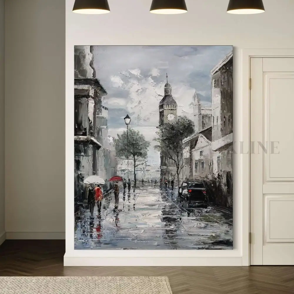 Hand-painted wall art depicting a rainy Parisian street with iconic clock tower and people carrying umbrellas. Plaster Art