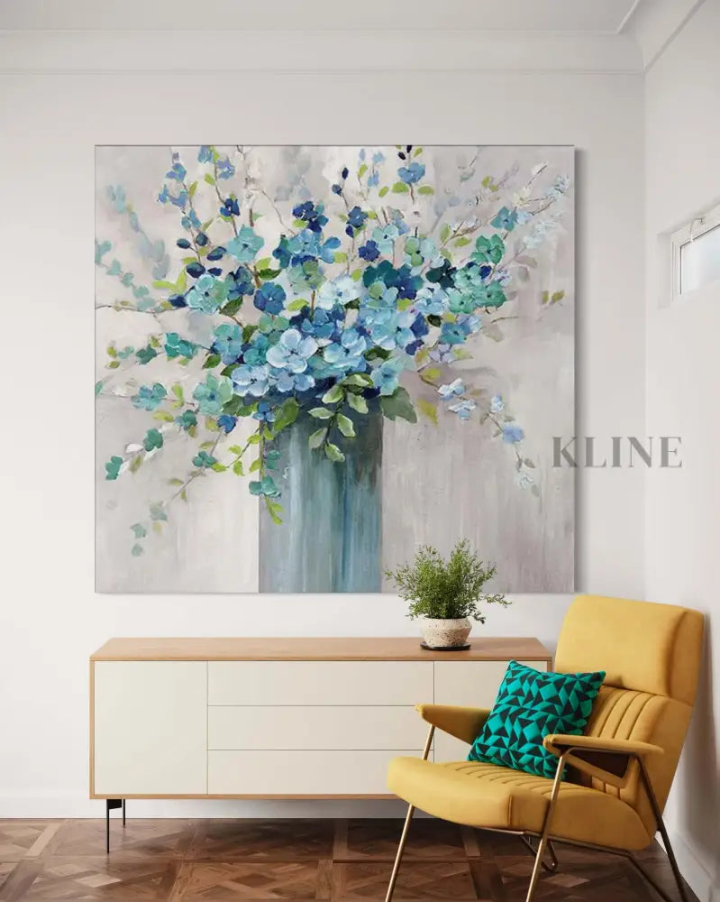 Hand-painted blue floral wall art by Kline Collective®, enhancing modern home decor with vibrant colors. 