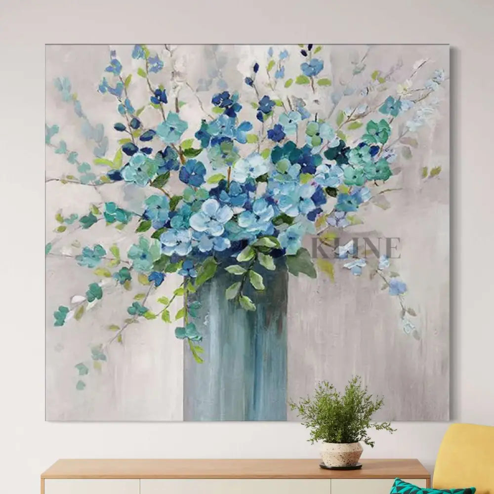 Hand-painted wall art featuring blue floral arrangement in vase, perfect for home decor by Kline Collective.