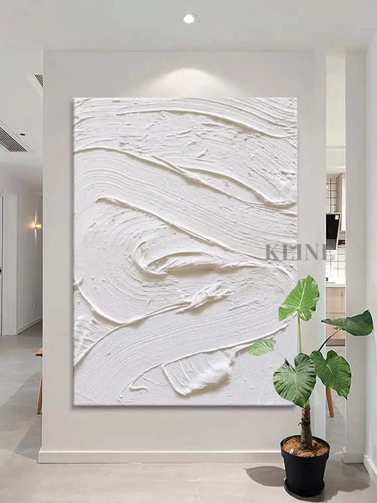 White textured oil painting on a wall, showcasing minimalism and abstract design in an elegant interior. Arte de la pared del comedor